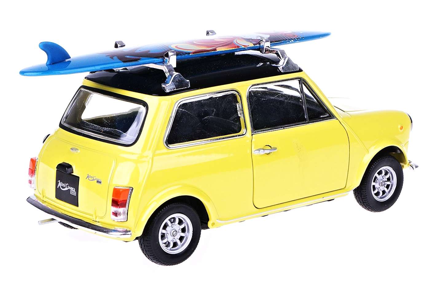 Welly MOQ Mini cooper 1300 with surf (yellow) 1:24
