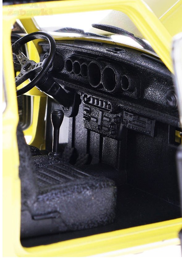 Welly MOQ Mini cooper 1300 with surf (yellow) 1:24