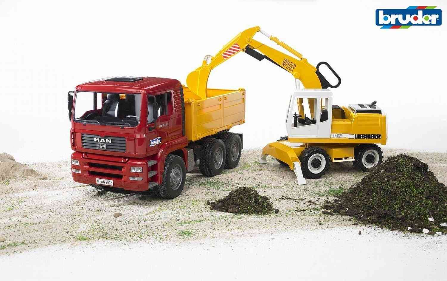 Bruder 2751 MAN TGA nákladní auto s bagrem Liebherr