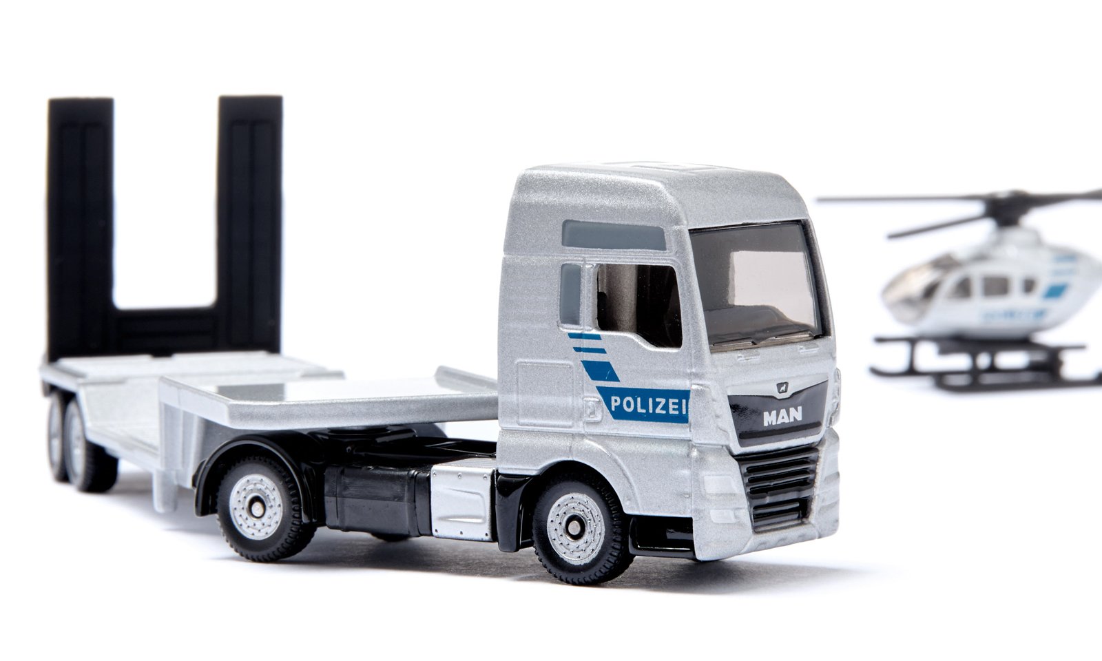 Siku Super - Policejní tahač MAN s návěsem a vrtulníkem